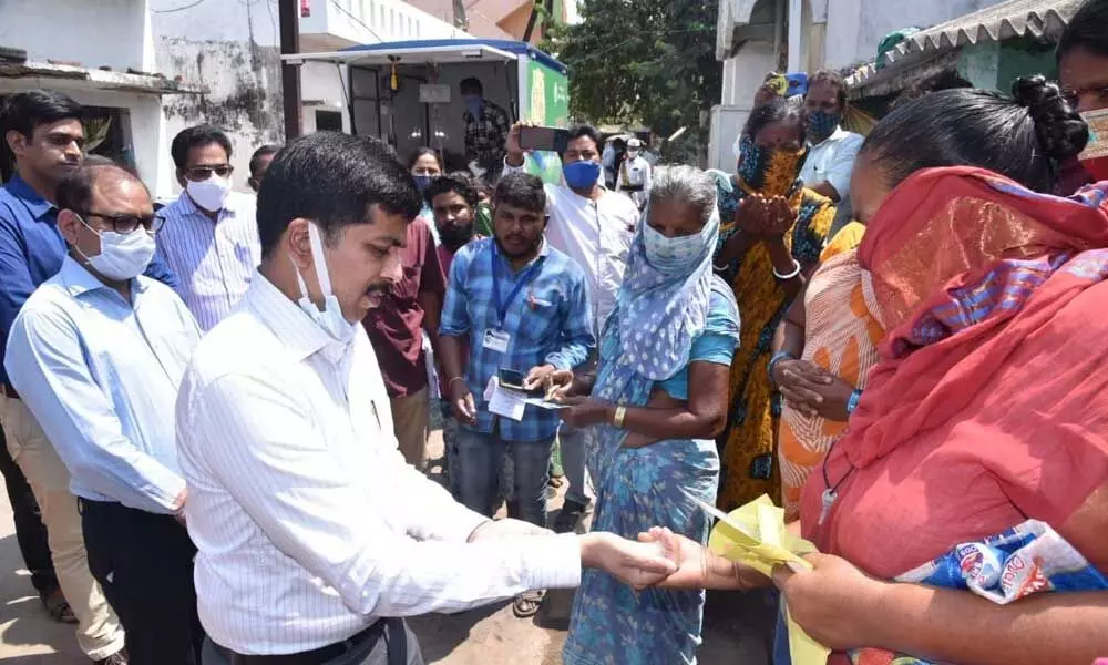 Civil Supplies Commissioner Kona Sasidhar during an interaction with people at Lankapatnam in Vizianagaram district on Tuesday