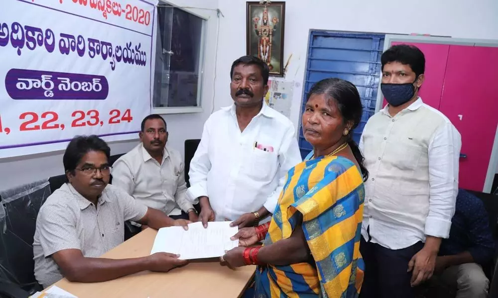 21st  ward TDP candidate A Munemma  submitting her nomination papers at Indiranagar Ward Sachiwalayam in Tirupati on Tuesday