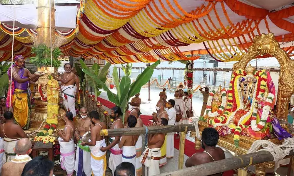 Priests conducting Dhwajarohanam to mark the beginning  of 9-day Brahmotsavams of Sri Kalyana Venkateswara Swamy at Srinivasa Mangapuram  on Tuesday