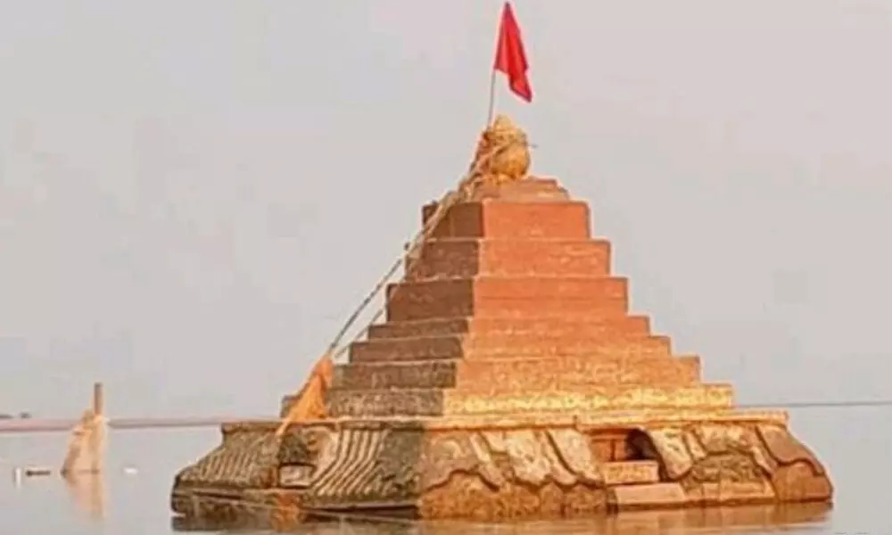 Sangameshwara temple seen surfacing in Krishna River at Kothapalli in Kurnool district