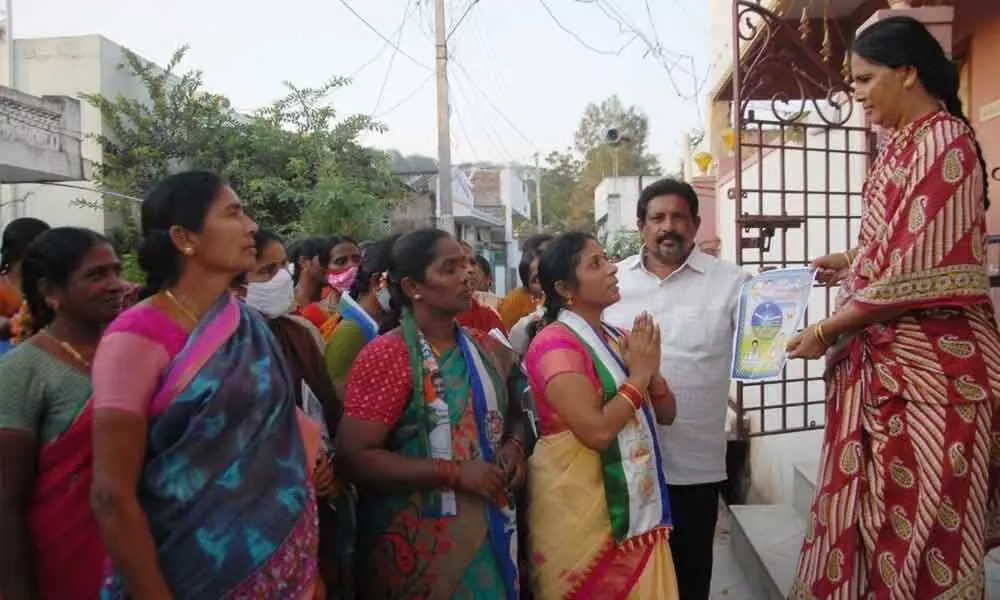 YSRCP candidate Tanneeru Nagajyothi leading the campaign in 31st division of Ongole on Tuesday