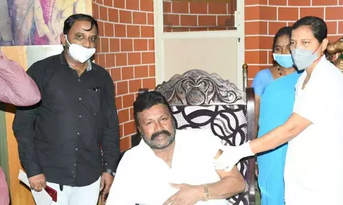 Minister Patil takes vaccine at home, triggers controversy