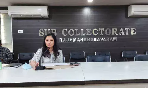 Sub-Collector Anupama Anjali reviewing progress  of works with officials in Rajamahendravaram on Tuesday