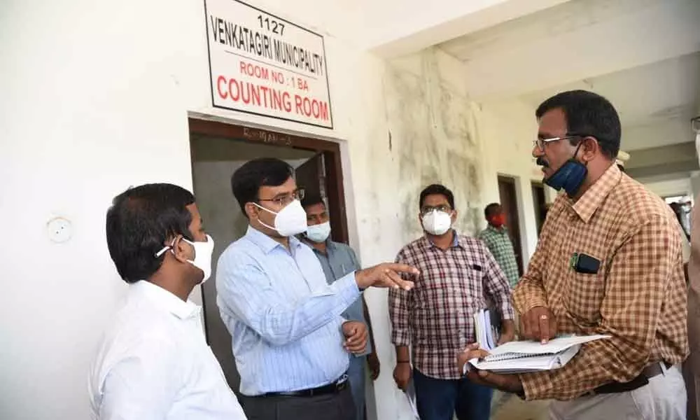 District Collector K V N Chakradhar Babu directing the officials on municipal polls in Venkatagiri on Wednesday