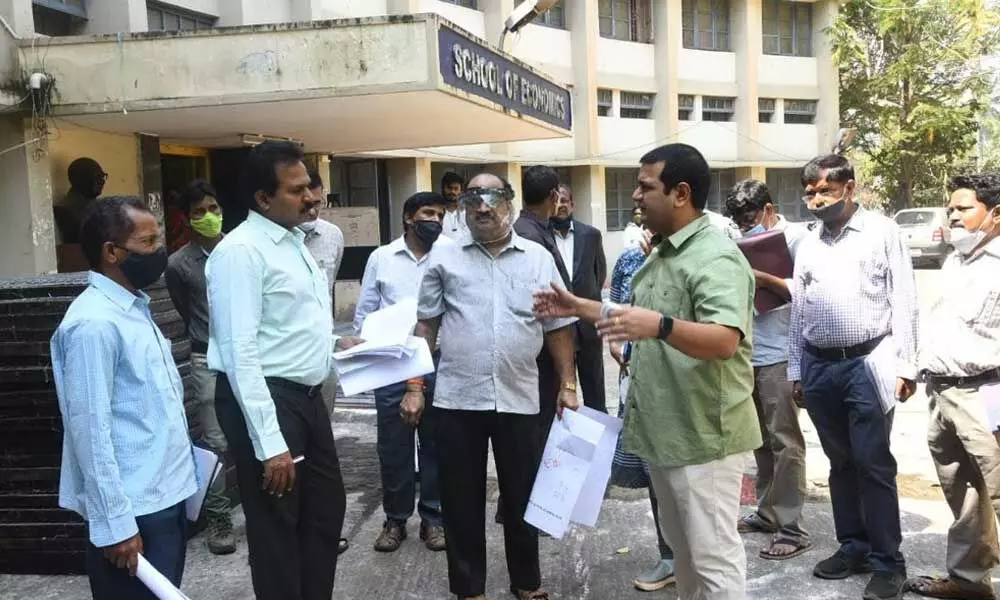 District Collector V Vinay Chand directing the officials of GVMC over poll arrangements at Andhra University in Visakhapatnam on Thursday