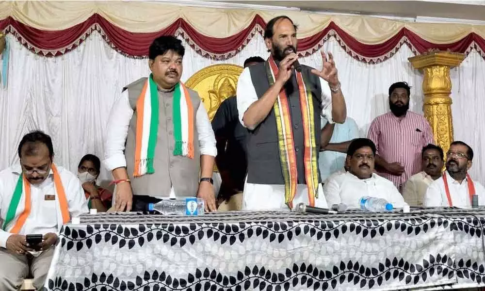 TPCC president N Uttam Kumar Reddy speaking at an election campaign in Warangal on Thursday.   Congress nominee for Grads Council seat Sabhavat Ramulu Naik is also seen