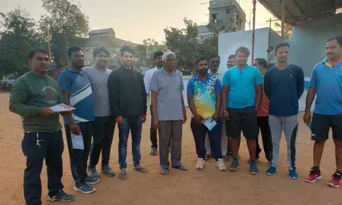 TJS candidate for Nalgonda-Khammam-Warangal Graduate MLC constituency Prof Kodandaram with morning walkers at Junior College playground in Bhadrachalam on Thursday