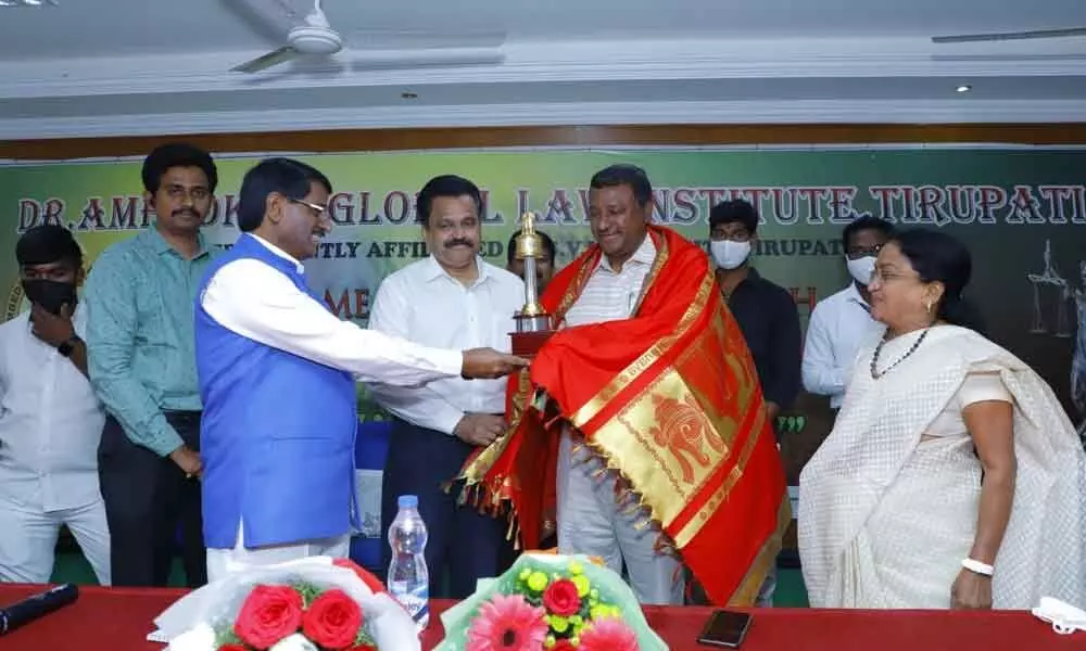 Chittoor district 10th Additional district judge Anwar Bhasha and Y K Varsity Law Department head Prof S V Pullareddy participate as chief guests at Ambedkar Global Law College new academic year celebrations in Tirupati on Friday. College chairman Ramasani Tippareddy, college chief Adhuri Shardhamma and Principal Vijay Bhera are also seen.
