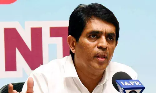 Minister for Finance & Planning, Legislative Affairs Buggana Rajendranath Reddy addressing the Press Conference  at R&B Building, in Vijayawada on Friday