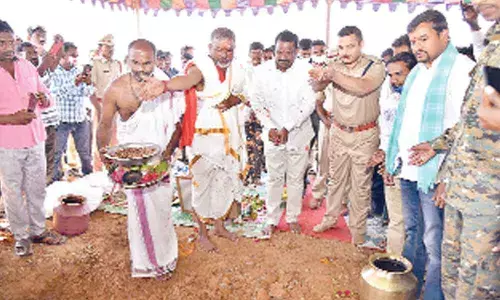Prakasam SP Siddharth Kaushal and Kanigiri MLA Burra Madhusudan Yadav participating in Bhumi Puja for new police station at Hanumanthunipadu on Friday