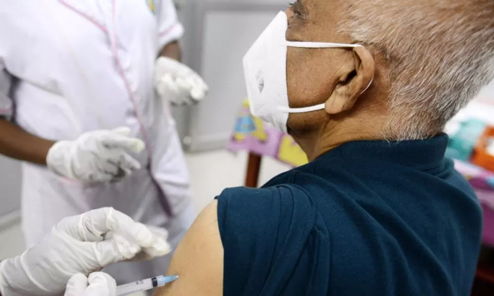 A senior citizen is taking Covid vaccine on Saturday in Tirupati