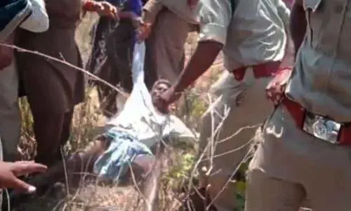 Forest officials forcefully evicting the tribals at Line Thanda under Gudur mandal in Mahabubabad district on Saturday