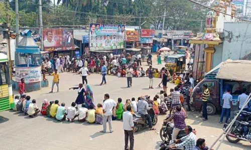 Tribals who reside on hilltop areas staging a rasta roko at S Kota in Vizianagaram district on Saturday