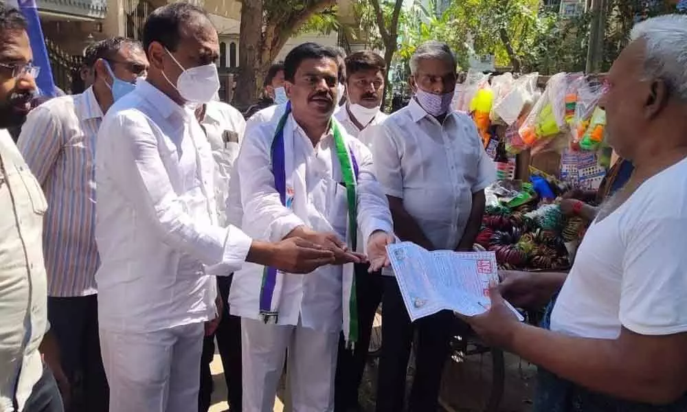 MLA Bhumana Karunakar Reddy along with party candidate N Sekhar Reddy campaigning at Dwaraka Nagar in Division No 42 in Tirupati on Sunday