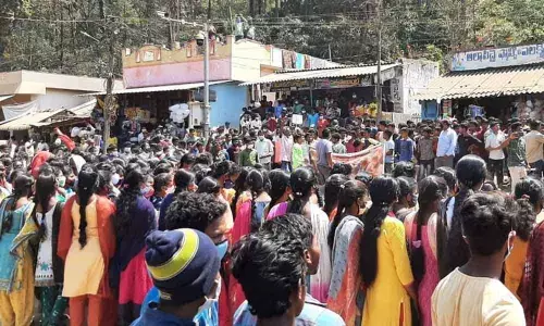 Youth from G K Veedhi mandal staging a protest  in Visakhaptnam on Sunday