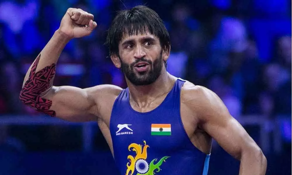 Bajrang bags gold, number 1 rank, bronze for Kaliramana