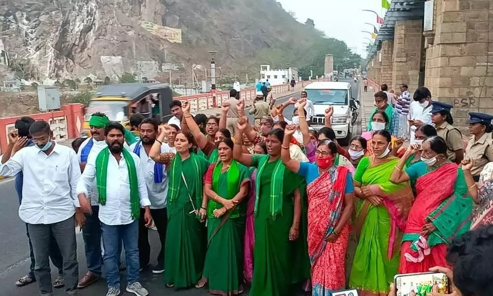 Amaravati capital region women farmers staging protest at Prakasam Barrage in Vijayawada on Monday