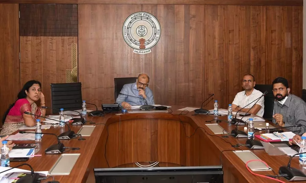 Chief Secretary Aditya Nath Das holding a meeting with officials of the Irrigation and other departments at the Secretariat at Velagapudi on Monday