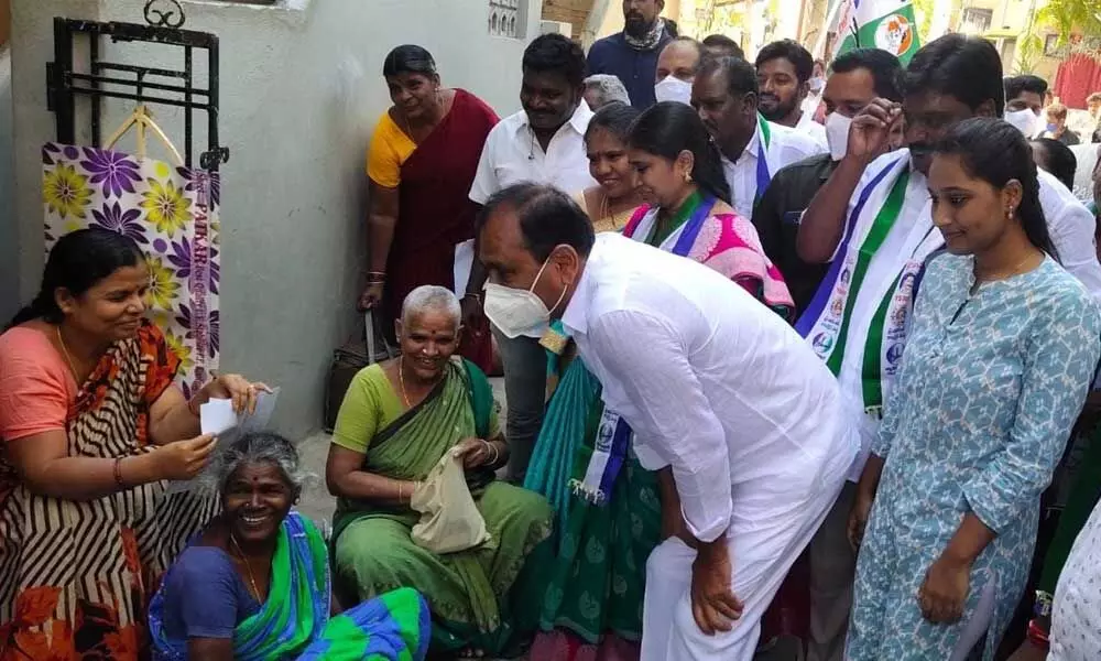 City MLA Bhumana Karunakar Reddy talking to a group of women during his electioneering in Korlagunta