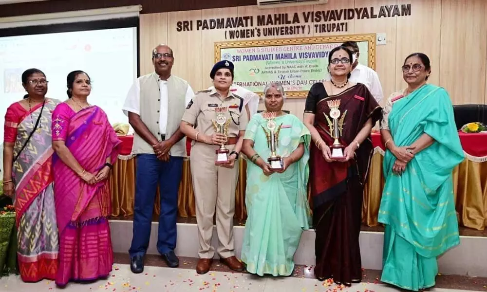 SPMVV Vice-Chancellor Prof D Jamuna felicitating SVIMS Director Dr B Vengamma and ASP Supraja on the occasion of International Women’s Day at Sri Padmavathi Mahila University in Tirupati on Monday