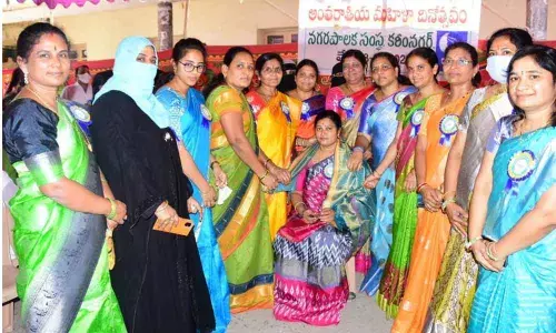 Municipal Corporation members felicitating Deputy Mayor Challa Swaroopa Rani at a programme in Karimnagar on Monday