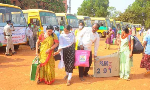 Election staff going to polling station at IGMC stadium in Vijayawada on Tuesday  	Photo: Ch Venkata Mastan