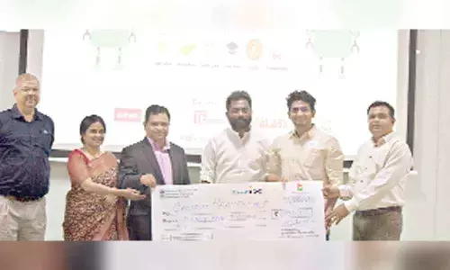 Col B S Rao, Head, School of Business, Sreedevi Devireddy, CEO, SRiX, Ajay Naini, Vice-President, Xilinx, Ravi Korukonda, Cofounder, Startup Hyderabad, Dr Suman Naredla, Head, NEST, SR University with the winner team NIT-Raipur in Warangal on Monday