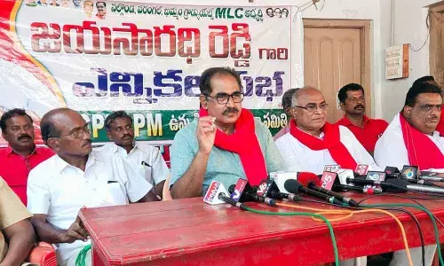 CPM State secretary Tammineni Veerabhadram speaking at a meeting in Hanamkonda on Tuesday. CPI State secretary Chada Venkat Reddy (to his left) also seen