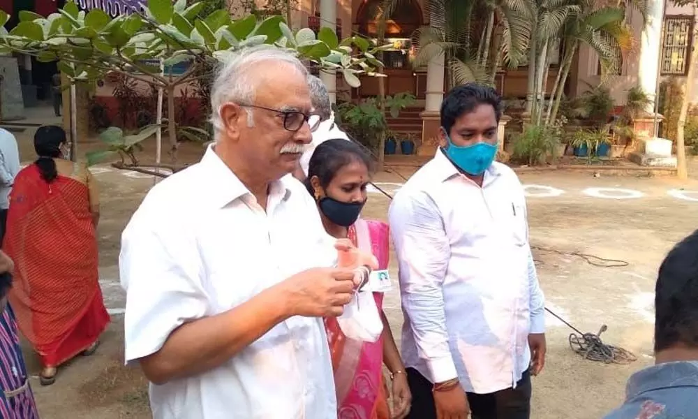 Former Union Minister and senior TDP leader P Ashok Gajapathi Raju proceeding towards the polling booth at Gurajada School at Vuda Colony in Vizianagaram to cast his vote in the municipal polls on Wednesday
