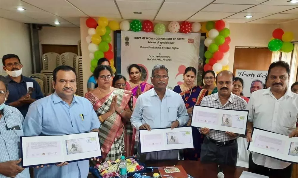 Chief Postmaster General, AP Circle, Venkateswarlu and others releasing a special cover on the first woman freedom fighter Duvvuri Subbamma