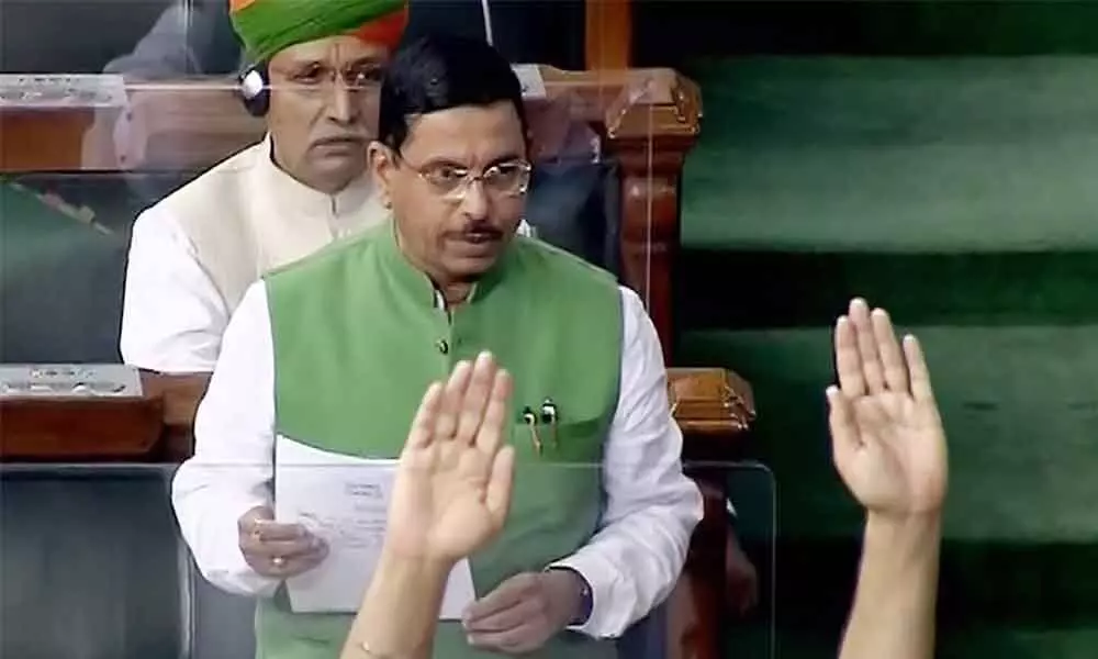 Opposition disrupts Lok Sabha over farm laws