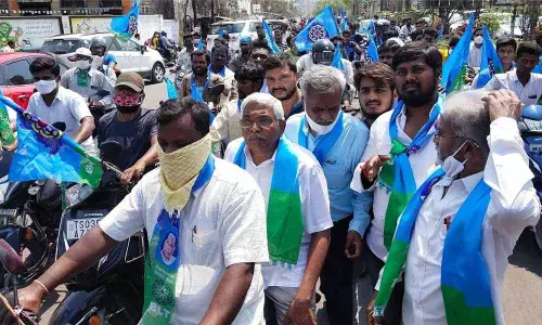 TJS founder Prof Kodandaram participating in bike rally in Warangal on Wednesday