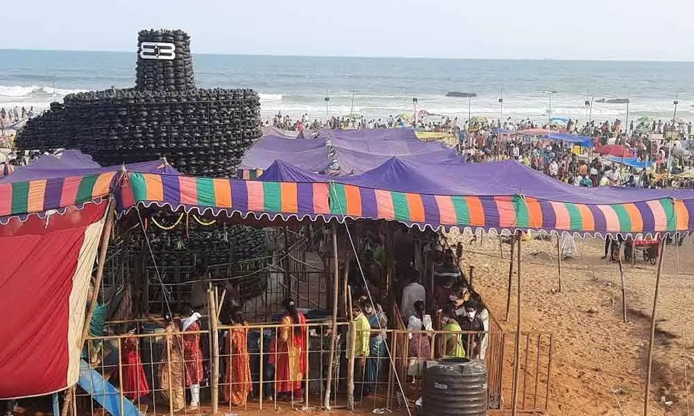 A mammoth ‘Siva Lingam’ being set up at Beach Road as part of the annual Sivaratri celebrations organised by T Subbarami Reddy Lalitha Kala Parishath with 108 crore ‘lingams’ in Visakhapatnam. Photo: Vasu Potnuru.