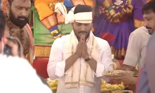 Chief Minister YS Jagan Mohan Reddy performed Abhishekam to mark the Mahashivaratri festival at the NTR Stadium in Gudivada.