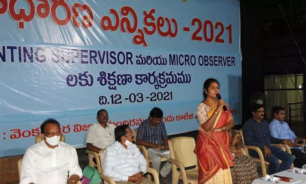 Guntur Municipal Corporation Commissioner Challa Anuradha addressing counting staff in Guntur on Friday