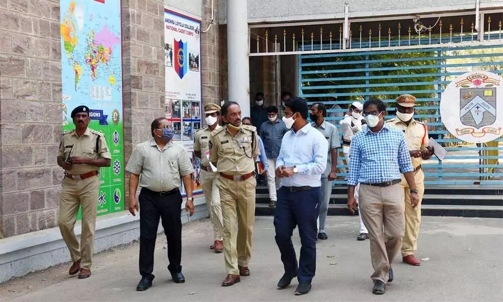 Collector A Md Imtiaz, police commissioner B Srinivasulu and municipal commissioner Prasanna Venkatesh inspecting the vote counting centre at Loyola College in Vijayawada on Friday