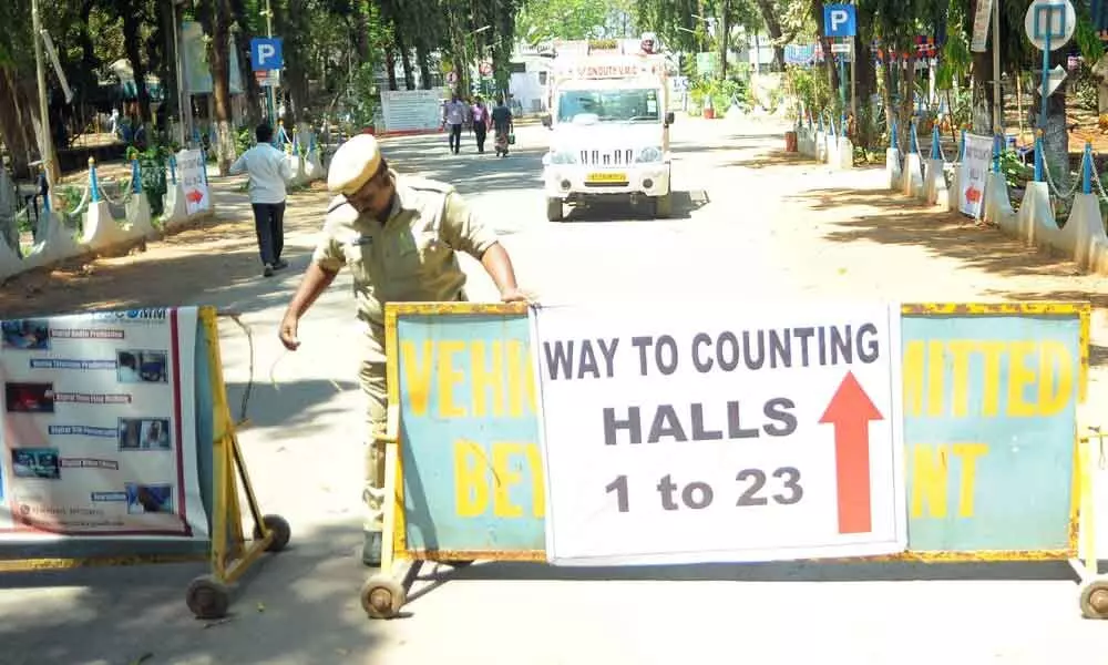 Barricades being set up at the entrance of the counting centre at Andhra Loyola College (ALC) in Vijayawada on Saturday