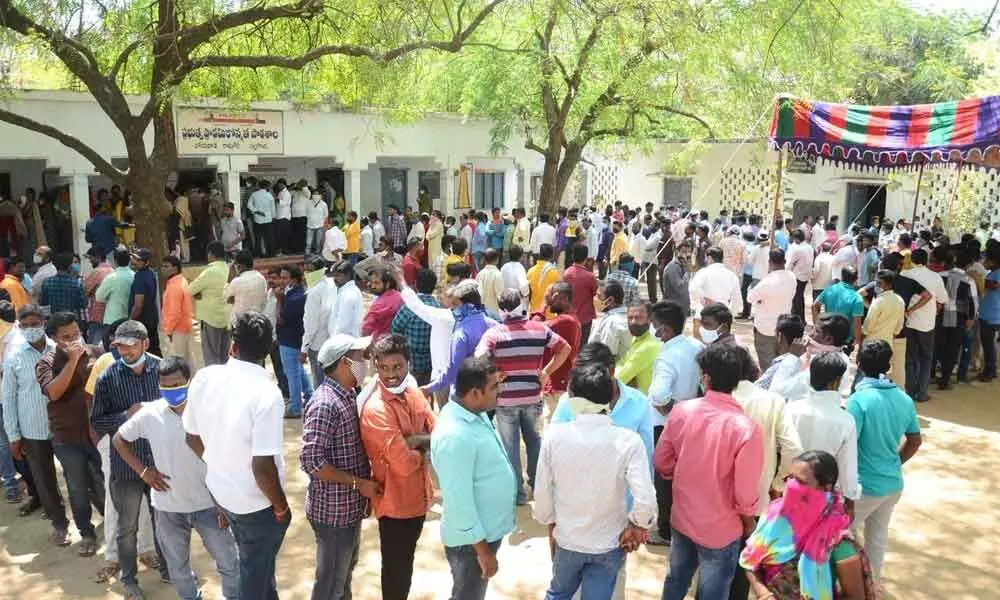 Long queues of graduate voters at the polling station at Government High School at Boyawada in Nalgonda town on Sunday