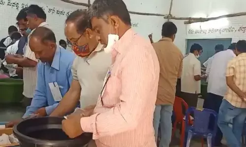 Election officials conducting counting at ZPH School in Giddalur on Sunday morning