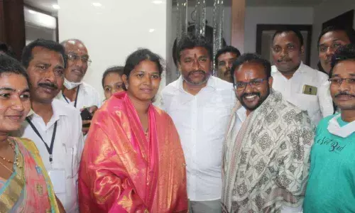 Minister for Endowment Vellampalli Srinivas celebrating the party’s victory in Municipal elections at camp office in Vijayawada