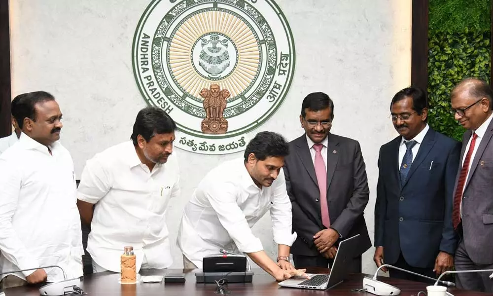 Chief Minister YS Jagan Mohan Reddy launching Temple Managment Syste at his camp office on Monday