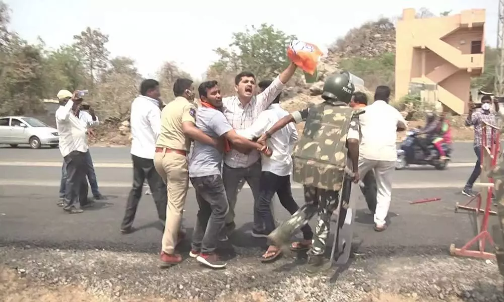 Police dispersing BJP workers, who were staging a protest in Mahabubabad  on Monday