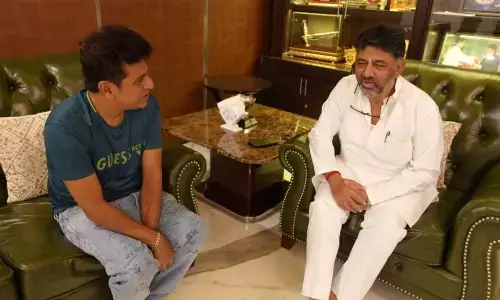 Shiva Rajkumar with DK Shivakumar at latter
