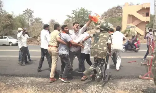 Police dispersing BJP workers, who were staging a protest in Mahabubabad  on Monday
