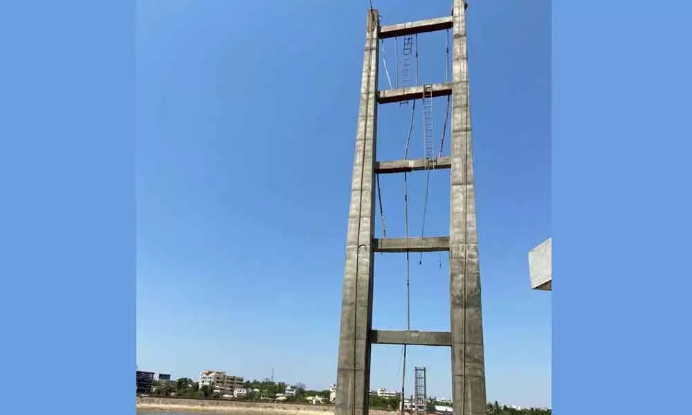 Suspension bridge under construction on Lakaram tank bund in Khammam