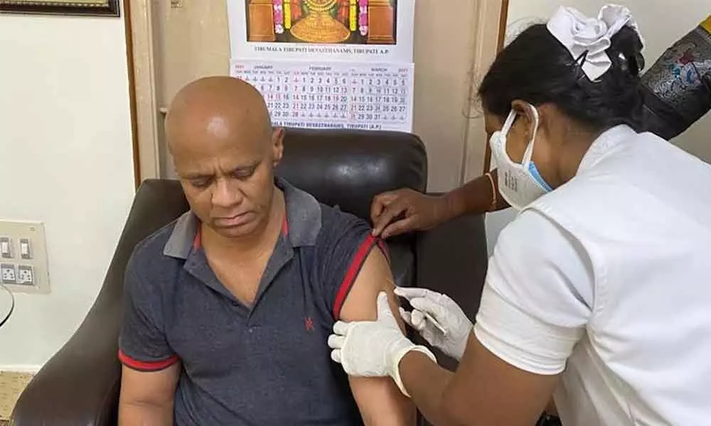Covid vaccine being administered to TTD Additional EO A V Dharma Reddy at Tirumala on Tuesday (Bottom) Chief priest Venugopala Deekshitulu getting vaccinated at Tirumala  on Tuesday