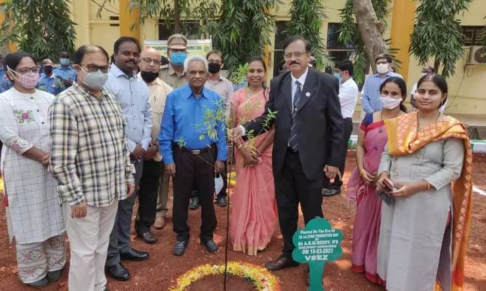 VSEZ Development Commissioner A Rama Mohan Reddy and other staff members at the Zone  Formation Day celebrations in Duvvada