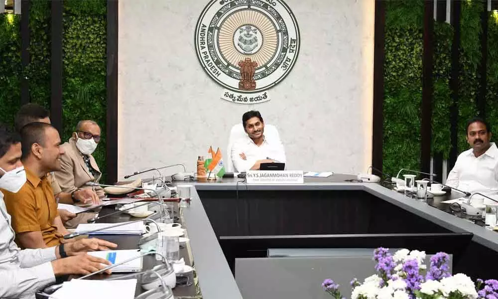 Chief Minister Y S Jagan Mohan Reddy reviews Covid vaccination process at his camp office in Tadepalli on Wednesday