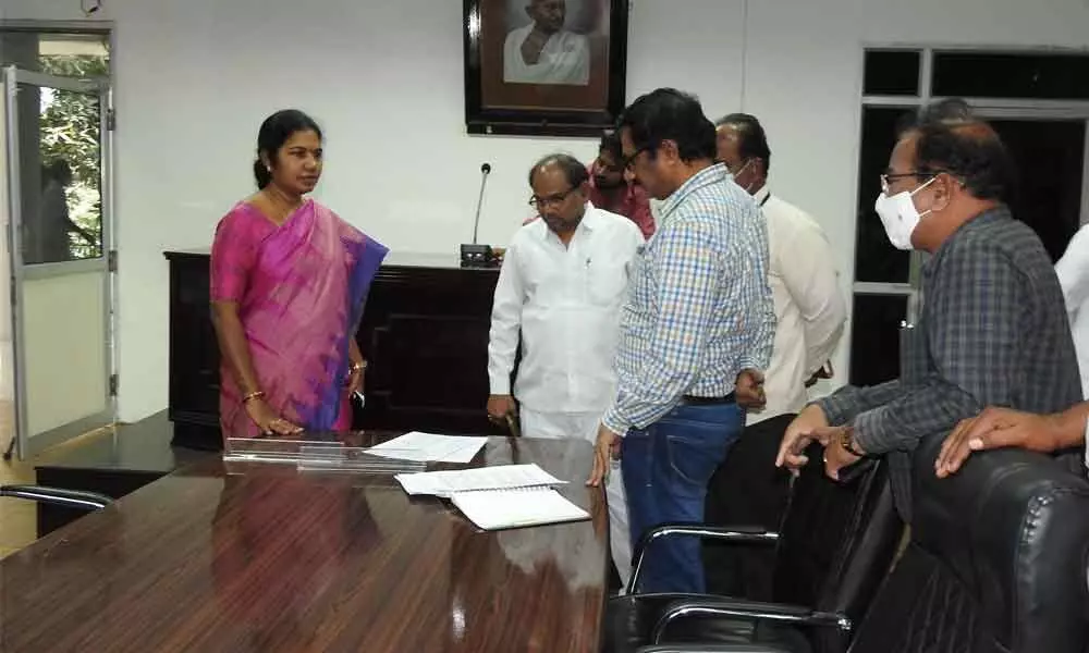 Guntur Urban SP R N Ammi Reddy and GMC Commissioner Challa Anuradha inspecting arrangements for swearing in ceremony of Mayor and new corporators in the GMC Council Hall in Guntur