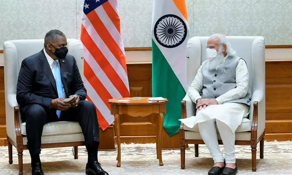 Prime Minister Narendra Modi with US Defence Secretary Lloyd Austin, in New Delhi on Friday